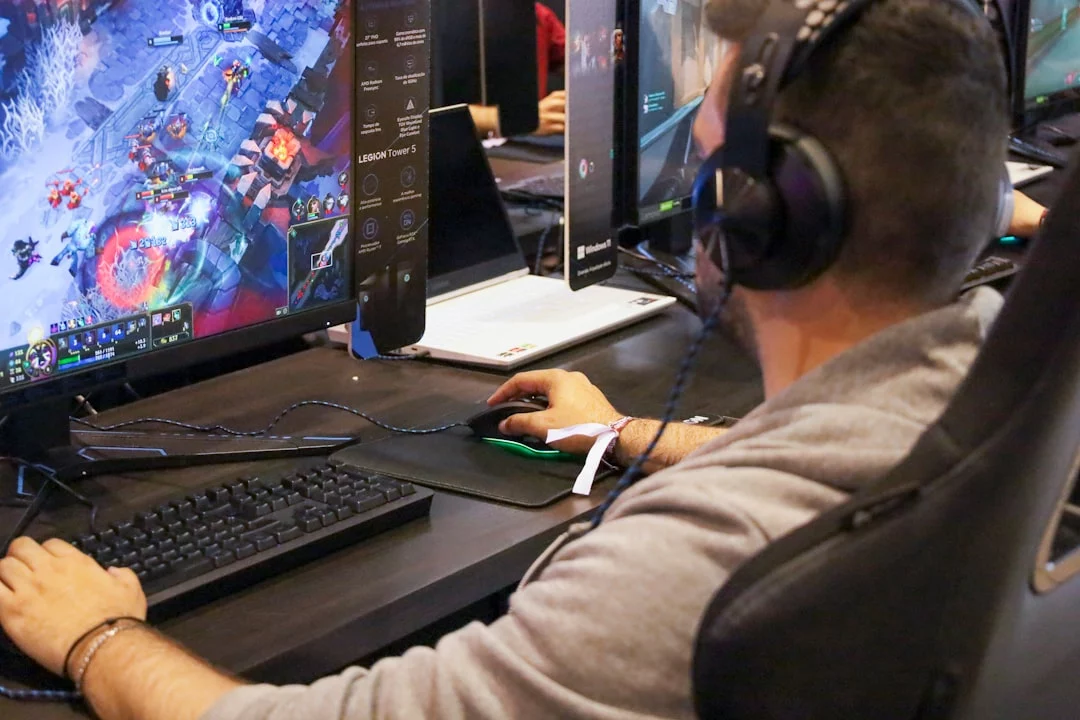 Gamer at a computer researching a Marvel Rivals ban appeal after a gameplay suspension